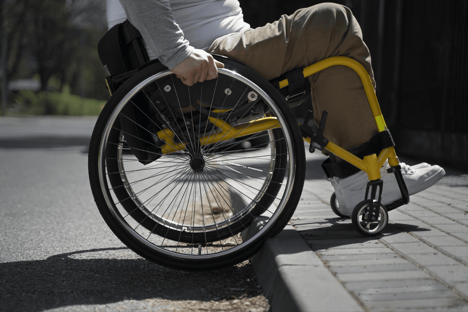 Wheelchair User Navigating Curb