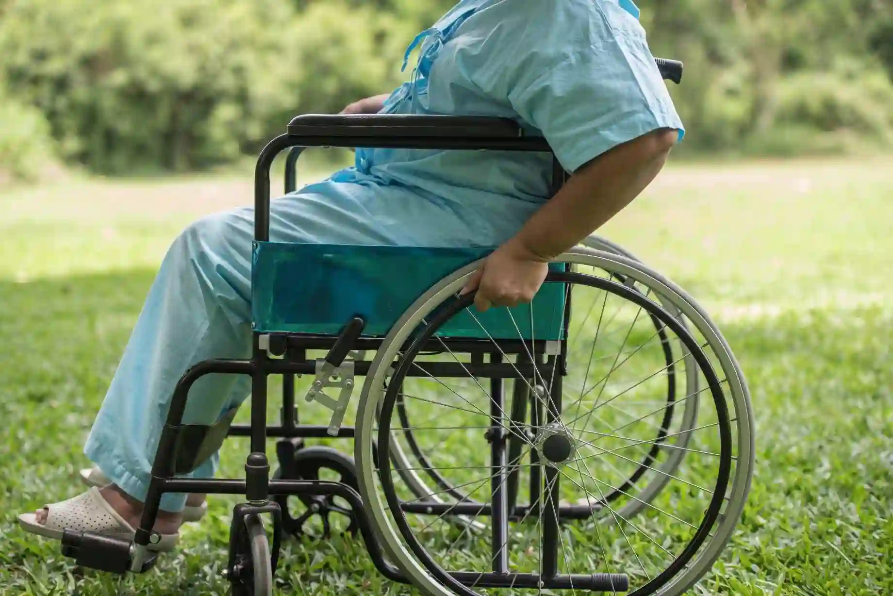 Wheelchair User in Outdoor Setting